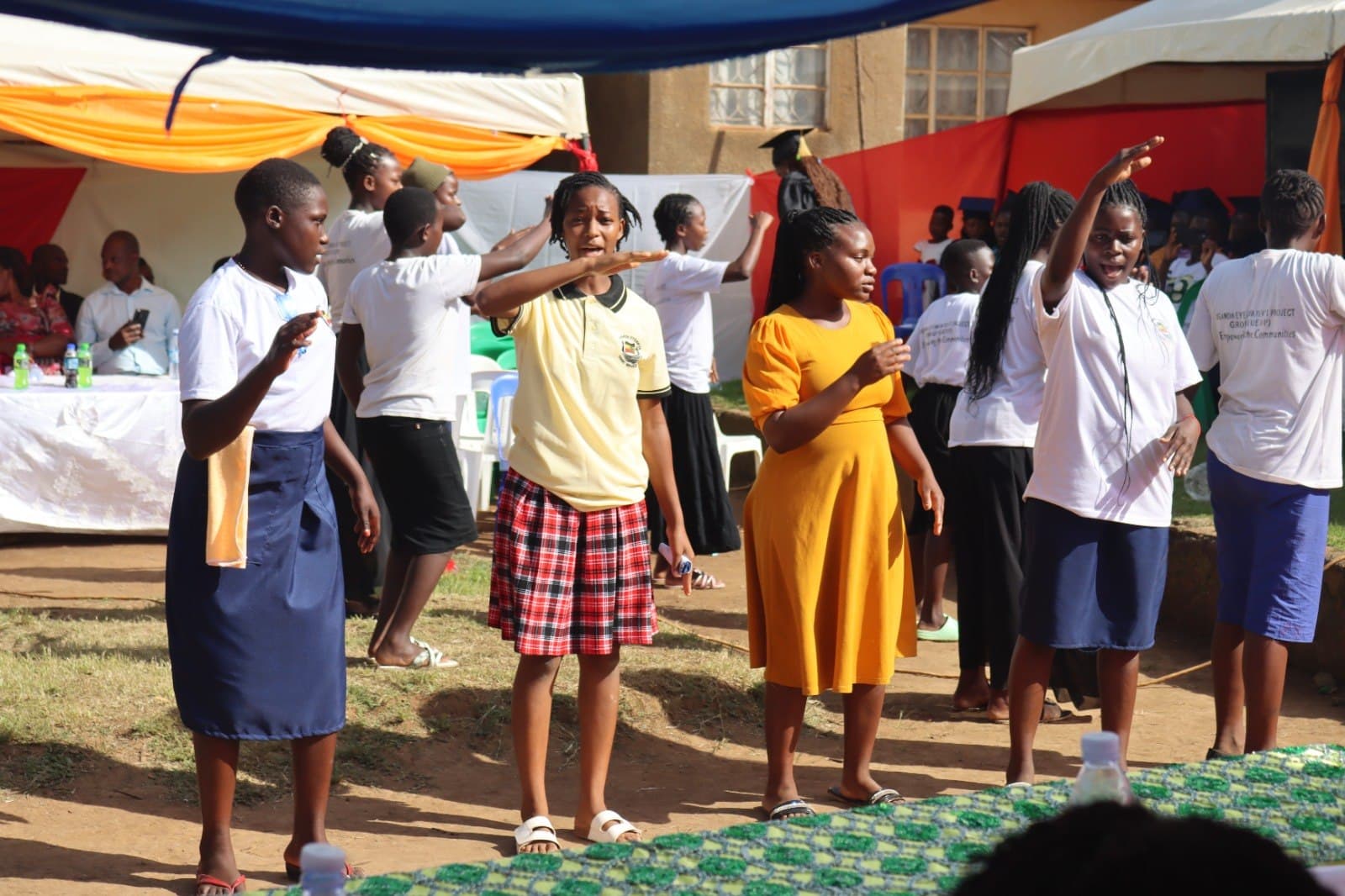 Young people perform during a community celebration.